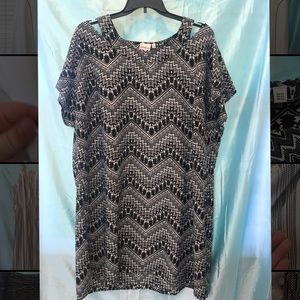 Cream and black Peek-a-Boo shoulder dress
